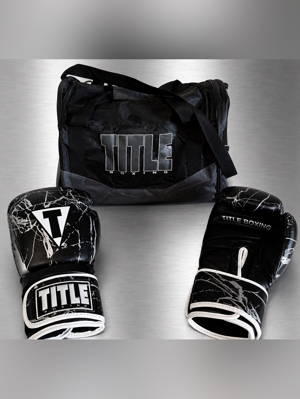 TITLE Boxing Gloves with Black Duffel Bag